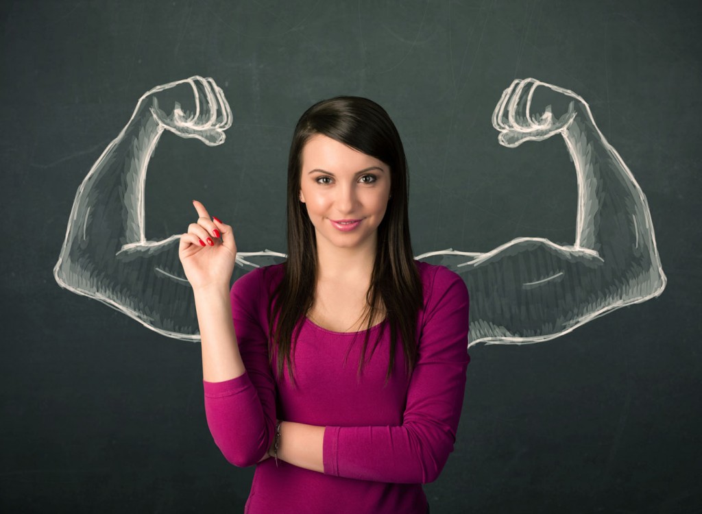 Pretty young woman with sketched strong and muscled arms